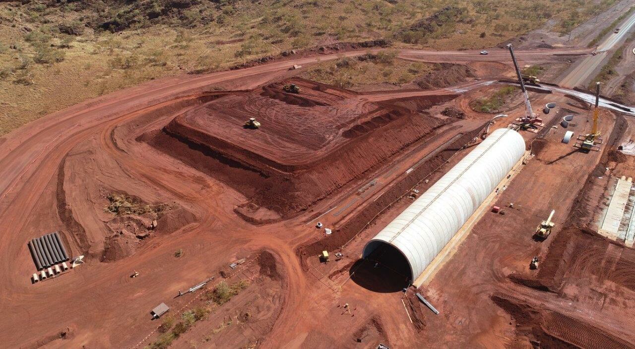 Precast concrete arch solution, TechSpan® by Reinforced Earth pictured on a largescale mine in Western Australia, surrounded by the red earth of Australia's north-west coast.