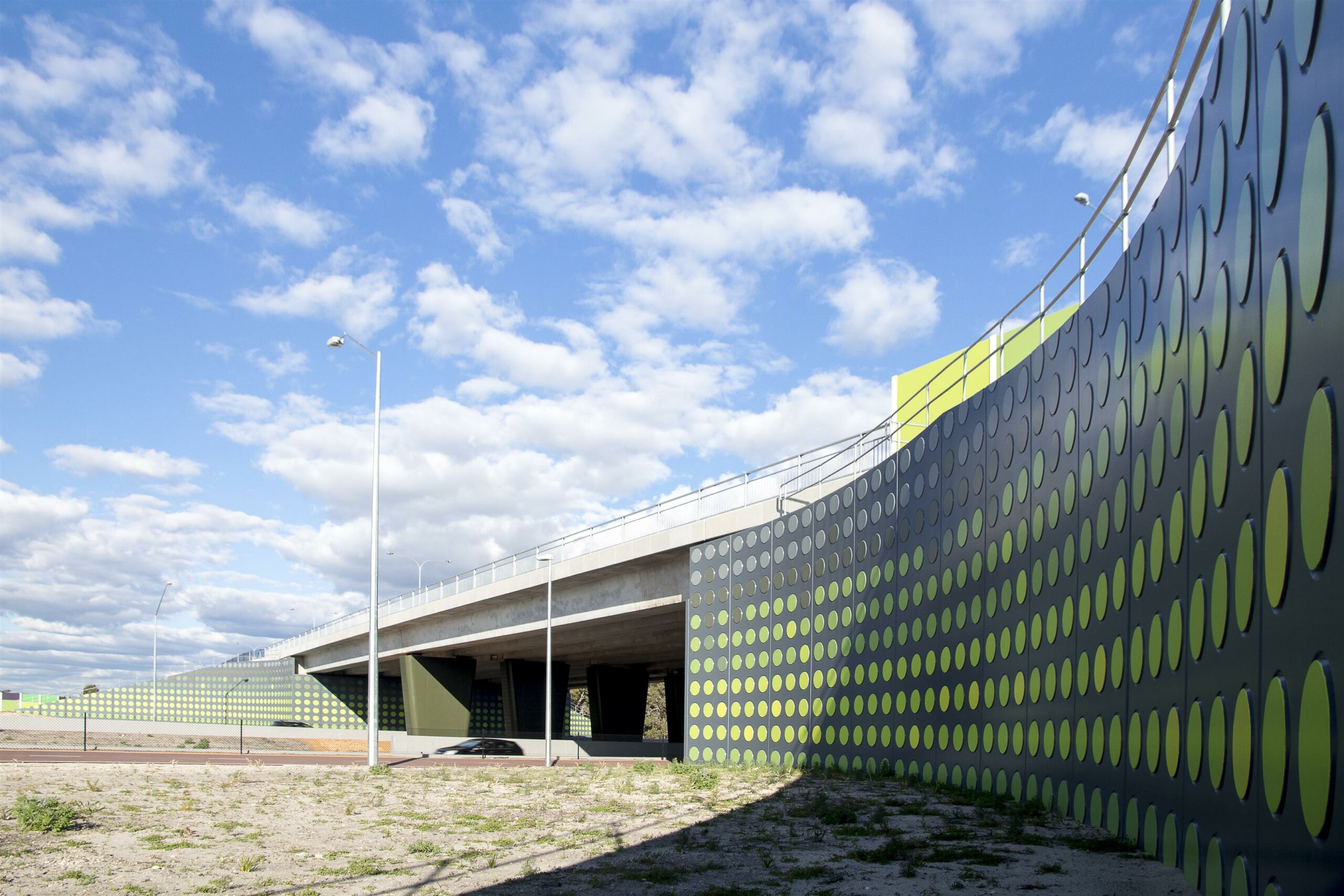 TerraTilt precast concrete retaining walls with green facade.