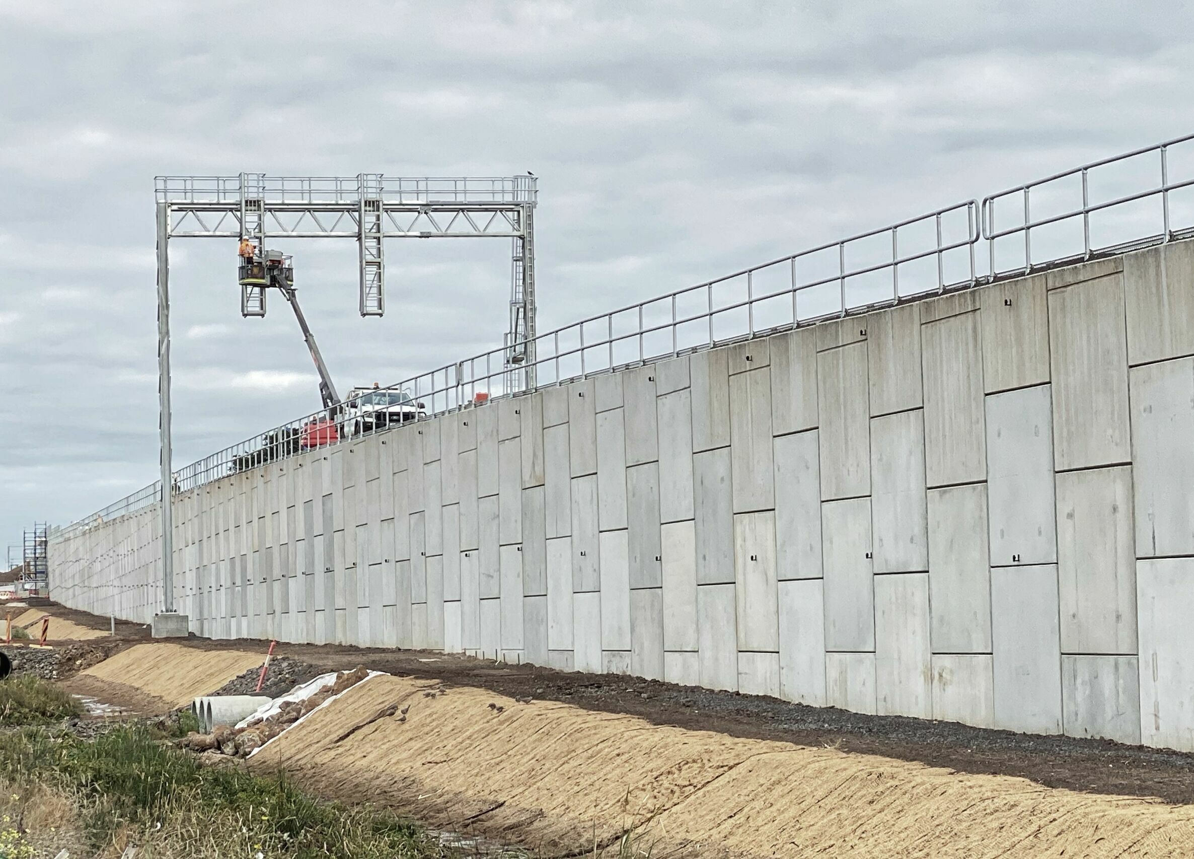 Reinforced Earth walls made of precast concrete and soil interaction structural supports at the South Geelong to Waurn Ponds Duplication Rail Project in Victoria, Australia